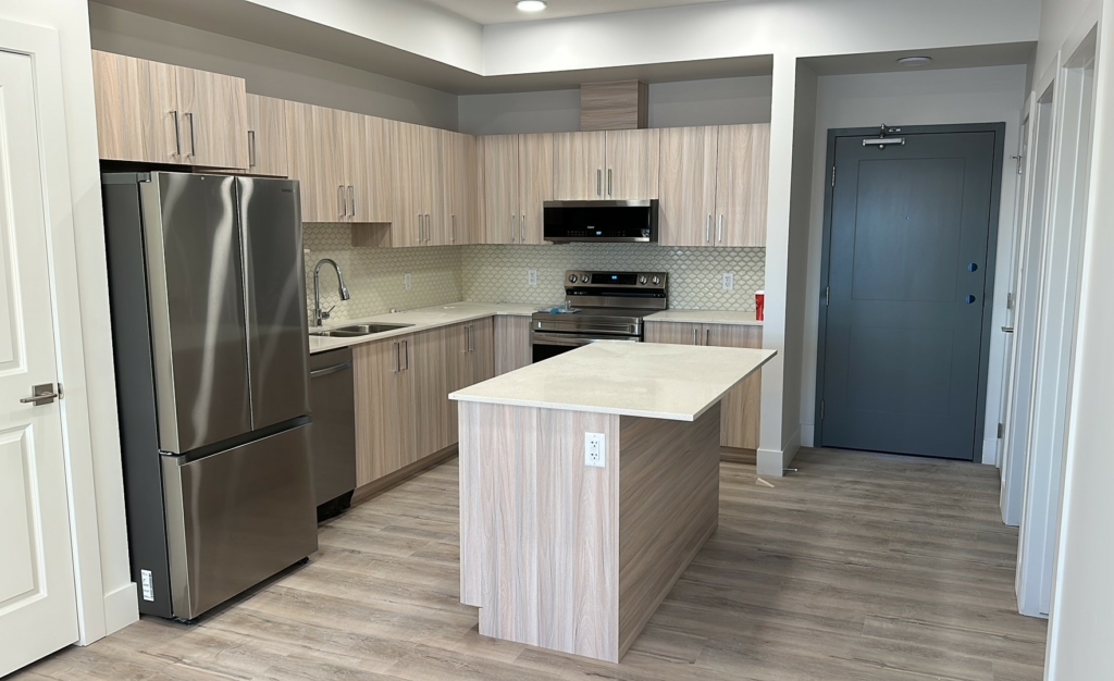 Interior Kitchen View of a unit within Nova Pine Hills, a brand new luxury apartment for rent by Rent In Yellowknife